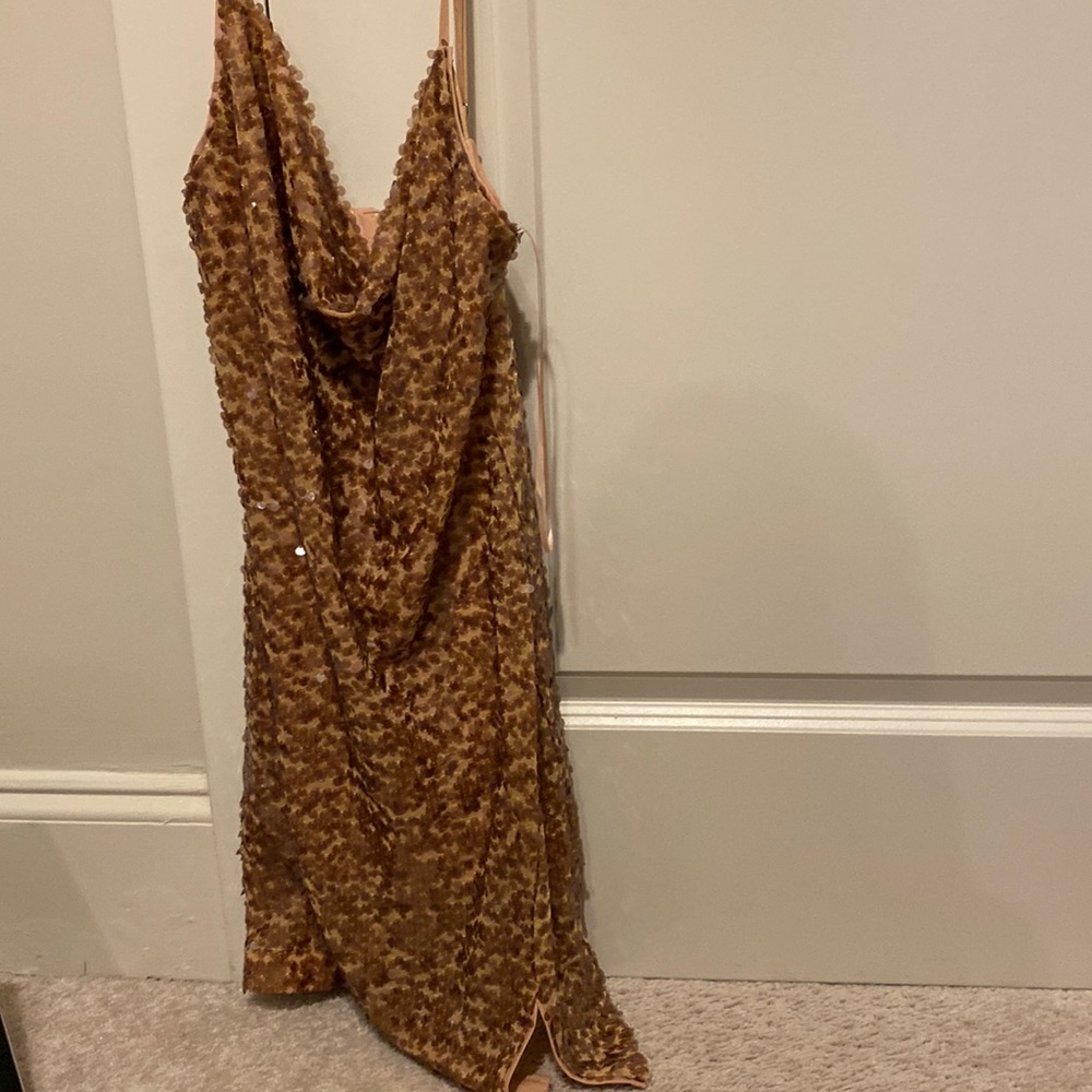 Nude sparkly cowl neck dress.